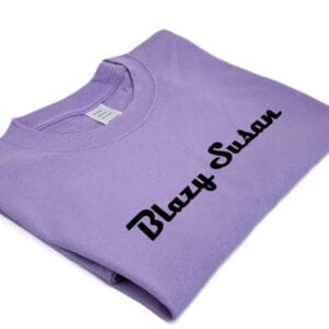 purple t shirt- folded, angle