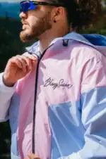 pink and purple windbreaker close up on logo